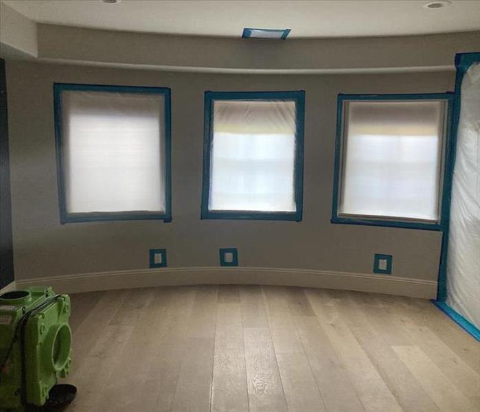 SERVPRO setting up containment measures for a mold remediation process in a residential home.